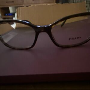Prada Women's Glasses in Tortoiseshell with gold accents